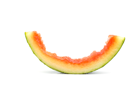 Fresh bitten watermelon slice isolated on white backgroundの写真素材