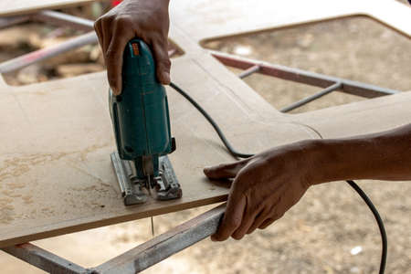 Reciprocating Saw. Power Tool Wood Cutting Construction Theme,cut according to the outline.