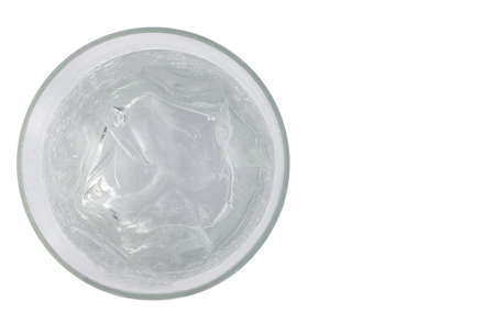 Glass with water and ice isolated on white background