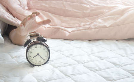 Don't want to wake up When hearing an alarmの写真素材