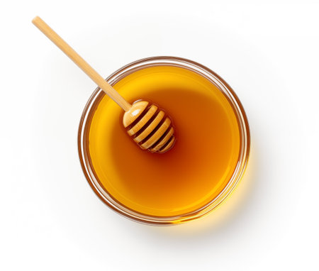 honey dipper and honey in jar on white background, top view illustration by Generative AIの素材