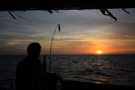 Free Day fishing and watch the sunsetの写真素材