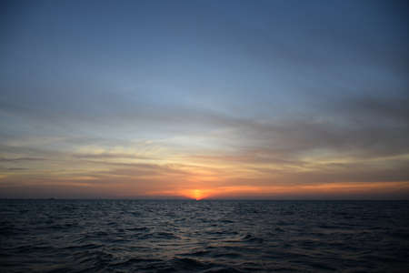 Sun is down on the seaの写真素材