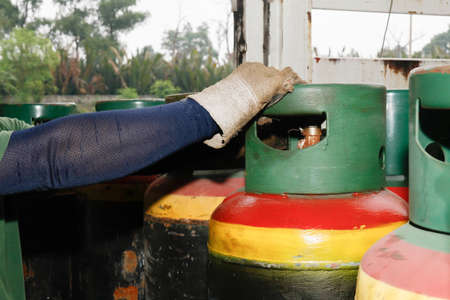 Chemical movement : Employees in hand gloves are NH3 (ammonia) cooling industry.の写真素材