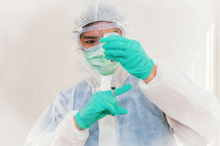 Asian researchers use syringes to treat coronavirus-induced lung disease patients COVID-19 lab...
