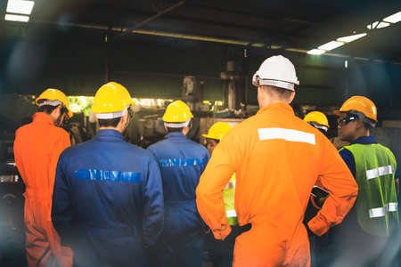 Rear view Engineering team meetings and supervised by the chief engineer to exchange ideas and assignments to share each work as daily and individual goals in the factory.の写真素材