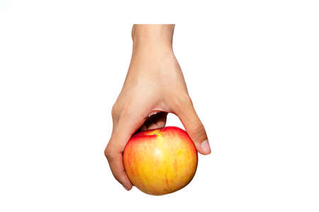Closeup, women hand picked fresh fruit, red apple with right hand, isolated white background :  Clipping Pathの写真素材