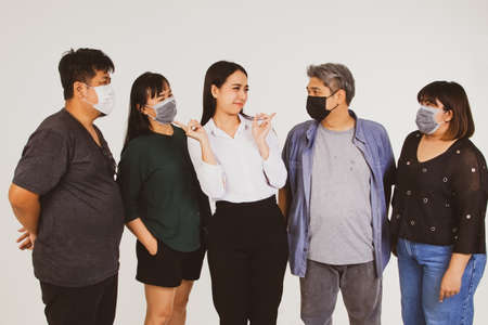 Beautiful woman with long hair does not wear a mask to prevent disease and pollution, standing with her index finger in the middle of the surprise.の写真素材