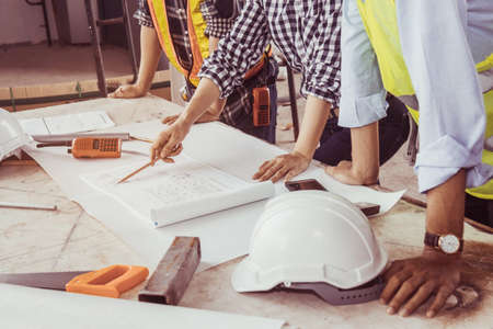 Engineering working teamwork is very importance. Co-worker will knew how to does the work success and not have anything wrong. Because buildings must safe for live and strong for accident.の写真素材