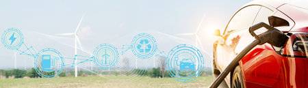 Electric car or EV clean energy vehicles natural resources renewable wind energy in wind farms, generating electricity to feed the charging station, environmentally friendly : Panoの写真素材