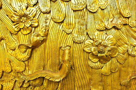 Painting stucco on temple wall,traditional Thai style,Nan province,Thailandの写真素材