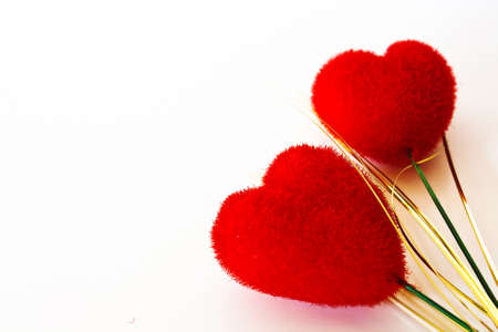 Two heart-shaped red velvet isolated on  white background.の写真素材