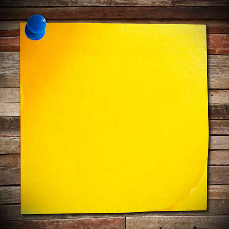 Note paper on wooden background の写真素材