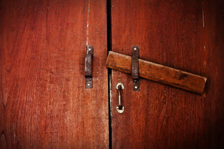 locked old wooden doorの写真素材