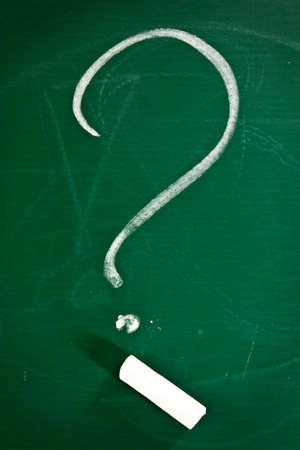 Question mark  and chalk on chalkboardの写真素材