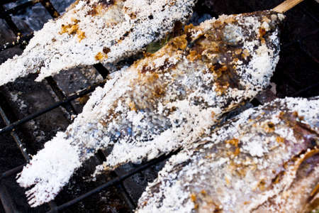 Salt fish grilled on charcoalの写真素材
