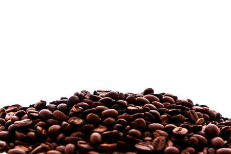 Coffee beans as a background isolated on white の写真素材