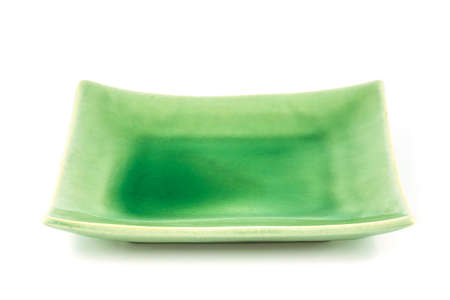 Empty green dish isolated on white backgroundの写真素材