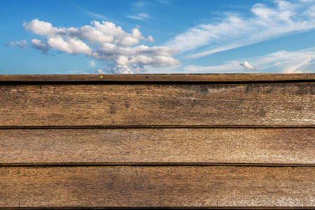 wood panel with blue sky backgroundの写真素材