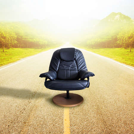 Office chair on the road  for leadership. Sometimes destined to succeed, it comes with risks.の写真素材