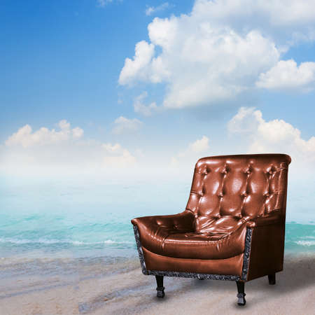 Summer concept. Leather sofa on the beach.の写真素材