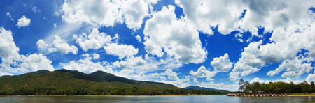 Panoramic view, lake against mountain and beautiful sky background.の写真素材