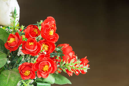 Artificial roses against blurry backgroundの写真素材