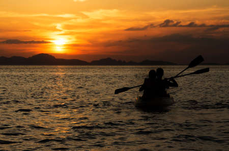 Happiness and romantic scene of love couples partners canoeing.