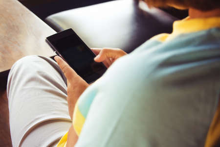 woman using tablet computer in cafe. Focus on tablet.