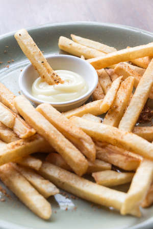 French fries. Potatoes cut into strips and deep-fried. Selective focus and close upの写真素材