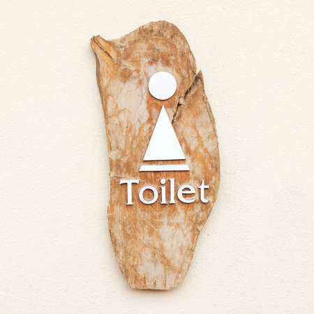Lady toilet sign wood on accessの写真素材