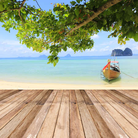 Perspective of wood terrace against beautiful seascape with free copy space use for background or backdrop.の写真素材