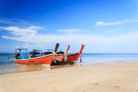 Longtail boat at famous sunny Long Beach, Krabi Thailand, Andaman sea, Exotic landscape in Thailandの写真素材