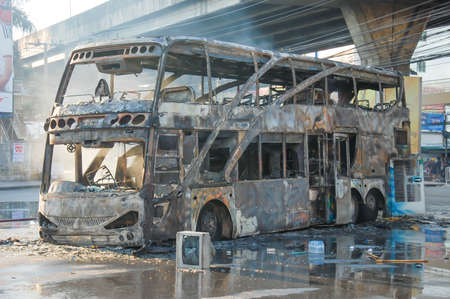 1 December 2013. The bus wreckage violent protests a large antigovernment rally on Rajamangala National Stadium area.Bangkok Thailandのeditorial素材