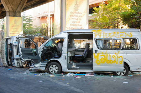 1 December 2013 Van demolished In front of Ramkamhang University vans destroyed by Antigovernment...