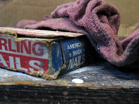 Vintage american workshop containing a box of old nails.の写真素材