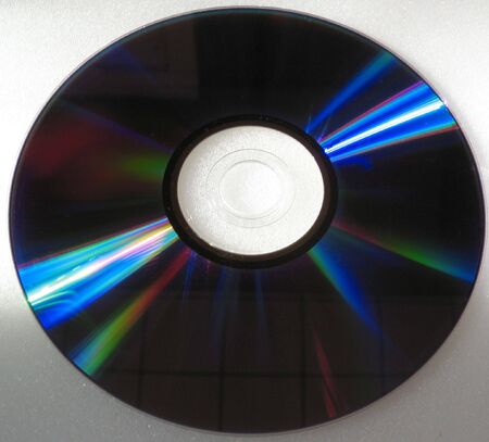 A blank cd with reflective purple coating.の写真素材