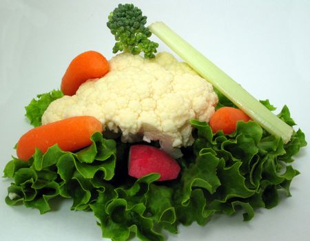 Many vegetables over a white backround looking tasty.の写真素材