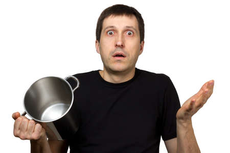 hungry man with empty cooking Saucepanの写真素材