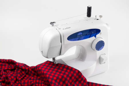 sewing machine with red cloth