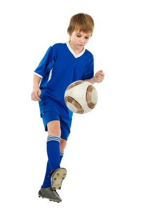 boy soccer player with ball on whiteの写真素材