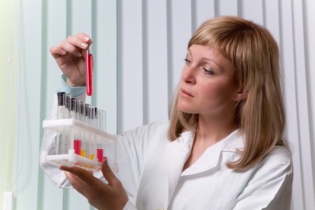 Lab worker with test tubesの写真素材