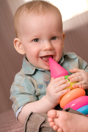 Little baby boy with toy, 1 yearの写真素材