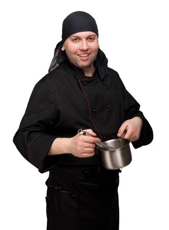 Chef in black uniform with bowl and whisk, isolated on whiteの写真素材