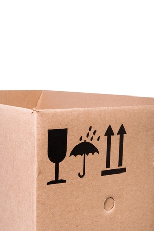 Cardboard box  with mail symbols, isolated on white backgroundの写真素材