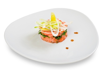 Salmon salad on plate, isolated on whiteの写真素材