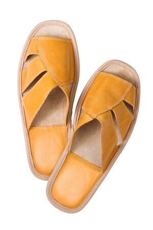 isolated yellow leather comfortable slippers, home shoes の写真素材