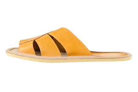 isolated yellow leather comfortable slippers, home shoes の写真素材