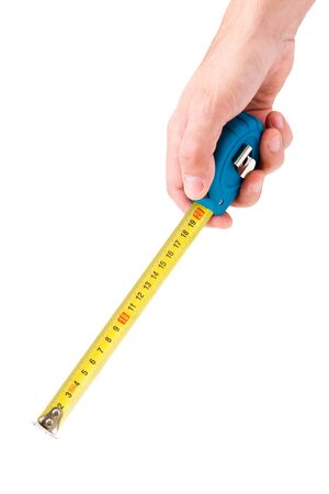 mans hand with tape measure isolatedの写真素材