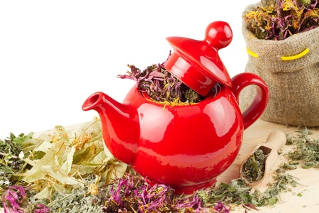 red teapot, mortar and pestle, sack with healing herbs, alternative medicine の写真素材